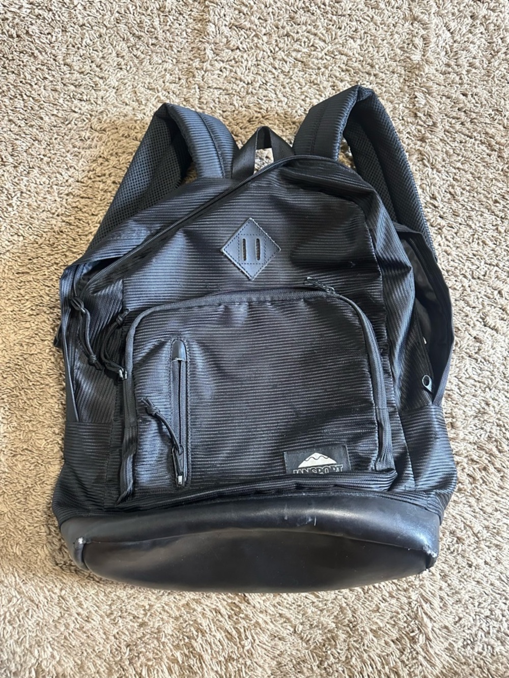 Vintage NCAA Jansport trans “triple black” backpack 00s